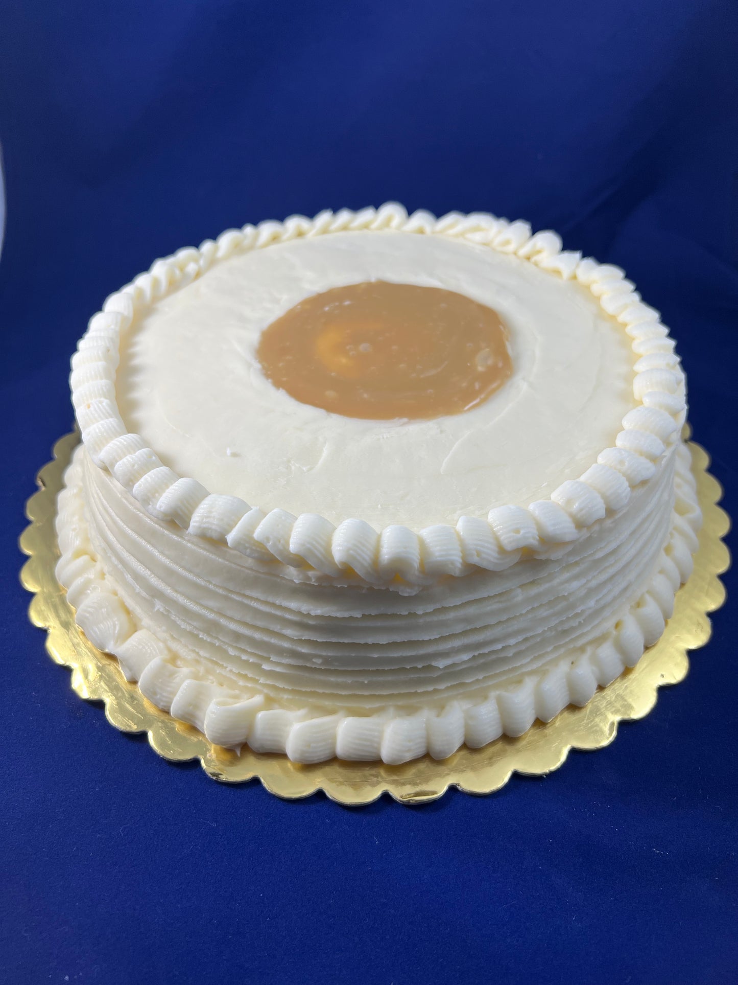 Vanilla Cake with Cream Cheese icing and Creamy Caramel filling - 8 inches serves 18